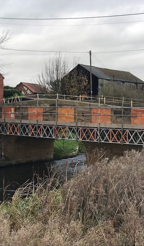 <h4>Tankards Bridge, Selby.</h4><p>Bridged access scaffold over the canal navigation, to give safe access to rebuild parapet walls on either side of the bridge.</p> <h4>Tankards Bridge, Selby.</h4><p>Bridged access scaffold over the canal navigation, to give safe access to rebuild parapet walls on either side of the bridge.</p>
